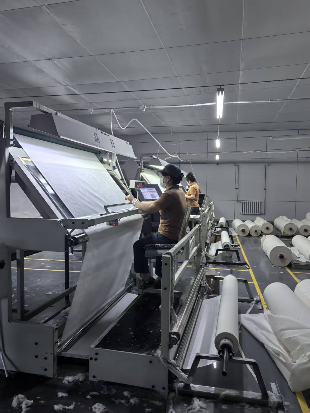 Company fabric-inspection photograph supplied by Hanzhong. It is not an inspection result for an individual order.
