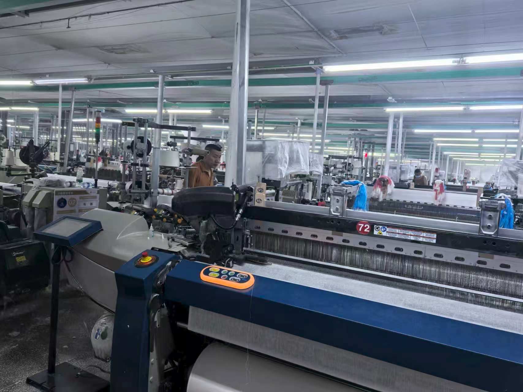 Loom and fabric in the weaving workshop